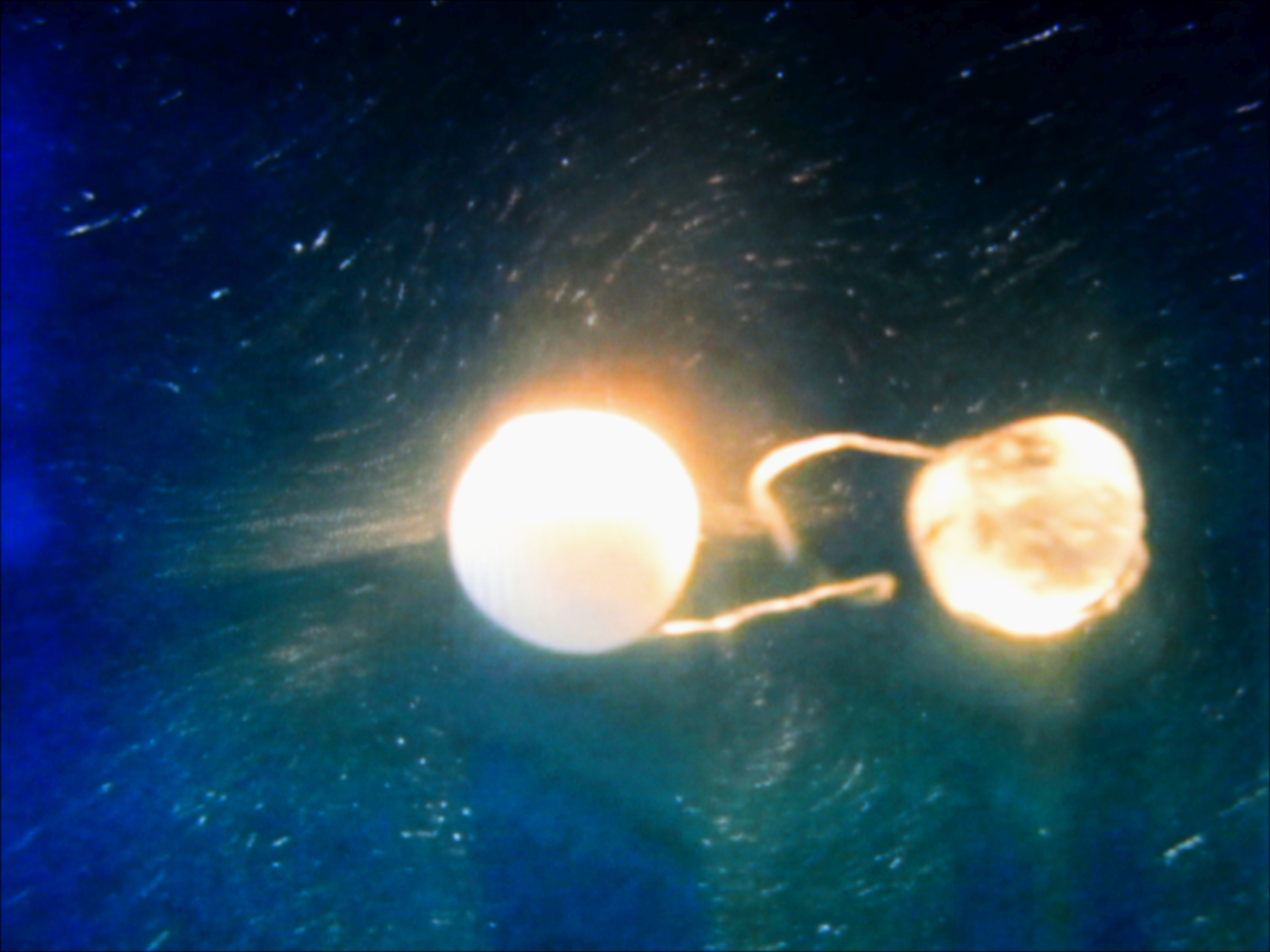 Streaming flows around two-sphere swimmer.